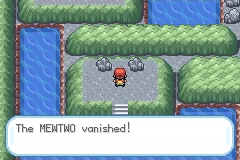 The player standing among rocks near water as the dialogue says that Mewtwo vanished.
